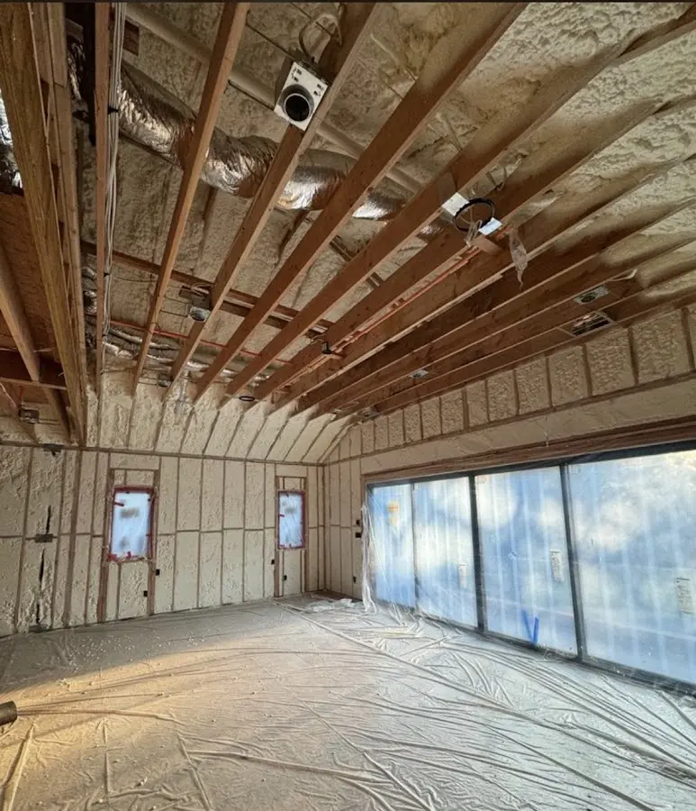 Interior walls and ceiling insulated with spray foam during new construction in Guthrie